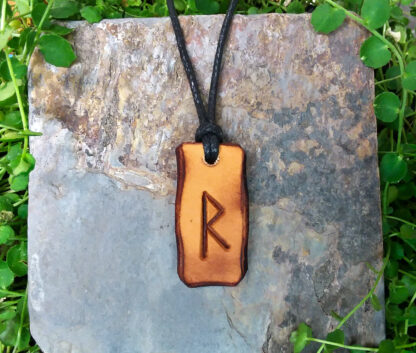 Raidho "Journey & change" Elder Futhark rune pendant made from genuine leather